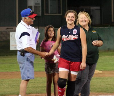 Sami accepting her pin