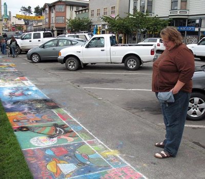 Donna viewing Pastels on the Plaza, Arcata