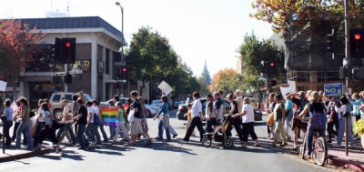 March up Main Street, past Third, in downtown Chico
