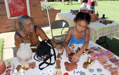 Diana and daughter at the CP&J fair trade table