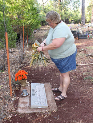 Donna lays down some fresh fall flowers