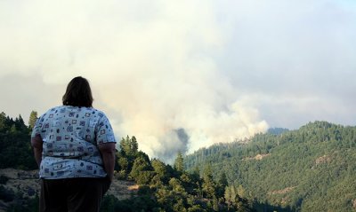 6-22: Donna watches fire burn in W. Branch Feather River canyon just east of Magalia