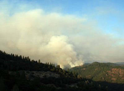 6-22: Wide view of smoking filling what was a blue sky