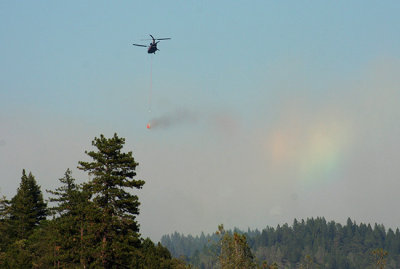 6-30: Army Chinook copter carrying water to the West Fire