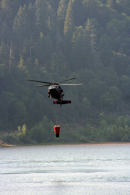6-30: Army Black Hawk copter filling up at Magalia Reservoir