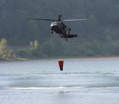 6-30: Black Hawk copter filling up at Magalia Reservoir