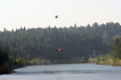 6-30: Two at a time - Chinook and Black Hawk copters approach Magalia Reservoir