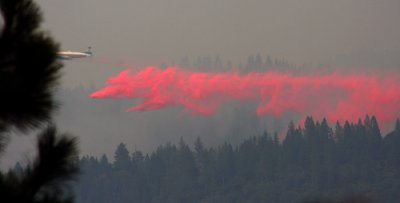6-26: Air tanker finds a few minutes of visibility to drop fiire retardant on the West Fire near Magalia