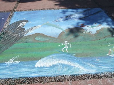 Chalk murals on the sidewalk outside the Museo