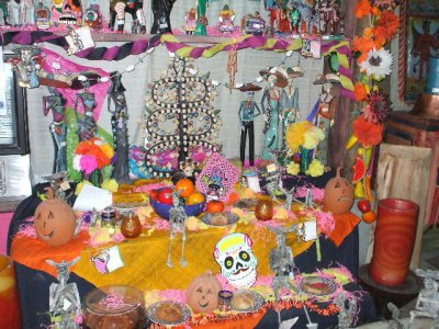 An altar for Dia de los Muertos, where lots of food and gifts were left.