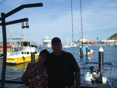 At the dock of Cabo, with our ship behind us