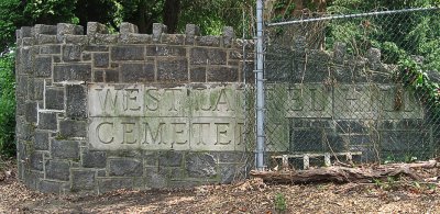 9 weeks later, the area has been cleaned up and some of the fence removed.  The sign looks better!