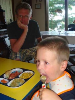 having dinner while uncle steve looks on