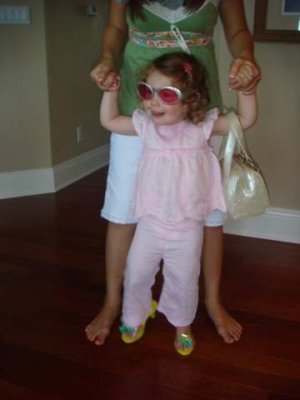 her new glasses, shoes and purse