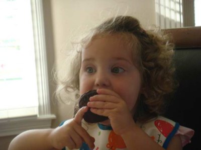 eating her cupcake