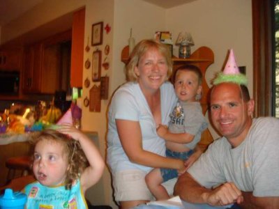 our family shots are so funny- two of us never hold still!