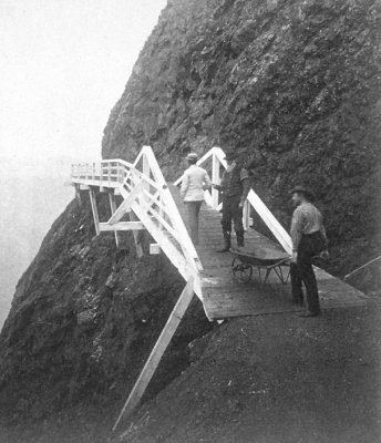 Gallery around cliffs leading to lighthouse, c1873