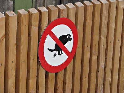 Sign on Sidewalk to Lake