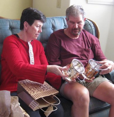 Patti D. and Ed admire Barbara's gifts