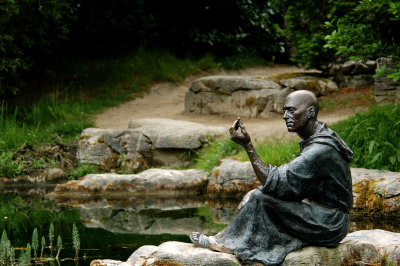 St Fiachra (the patron saint of gardeners) contemplating