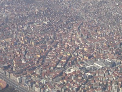 Approaching the airport, a sea of houses