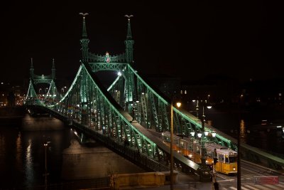 Liberty Bridge with the traditional yellow tram - Budapest, Hungary