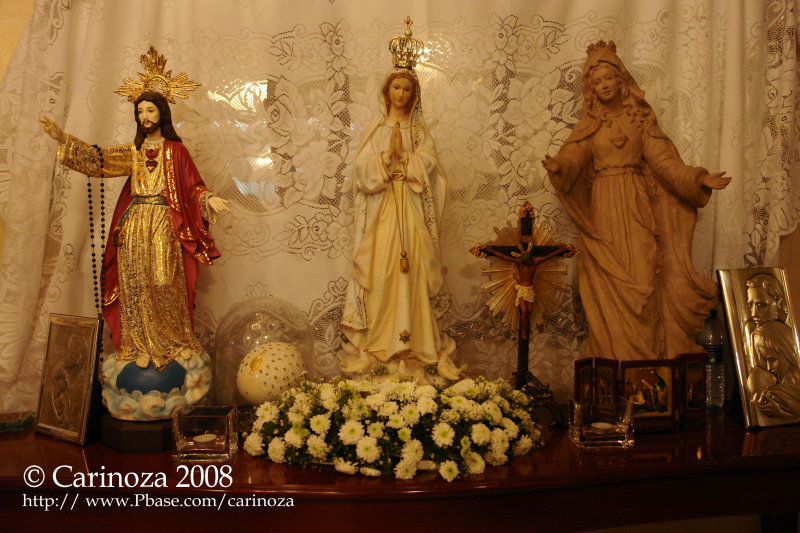 The Our Lady of Fatima image dominates the Santos residence
