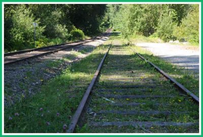 One track with, one without trains.