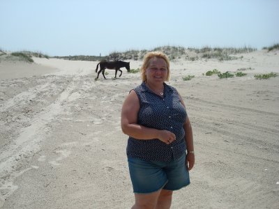 Susie and a wild horse.