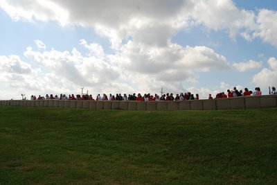 Students view the levee by LAke Pontchartrain
