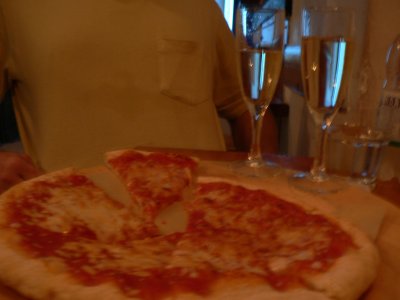 Our gourmet first night's dinner - pizza & prosecco.