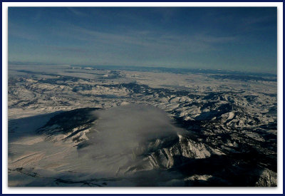 rocky mountain snow and clouds