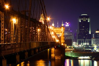 Downtown Cincinnati and the Downtown Cincinnati and the Roebling Suspension Bridge at Night