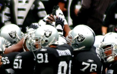 NFL Oakland Raiders huddle