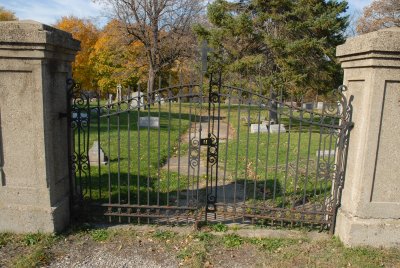 Great old cemetery surrounded by highway, Fox River and park district property.