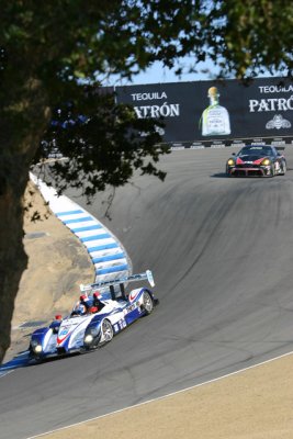 Dyson Racing followed by the PTG Panoz through the Corkscrew