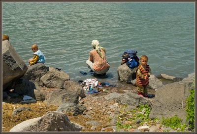 Washing clothes in lake Cildir