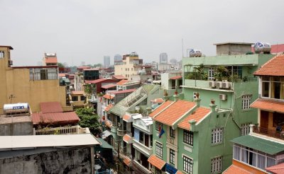 Hanoi old quarter overview  -- residential air conditioning and  water tanks are common in Hanoi