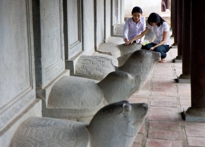 Temple of Literature -- the turtles represent famous scholars of the past, students touch for good luck with their exams