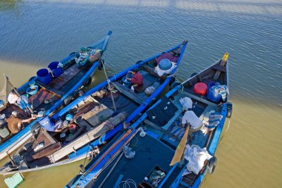 These families live on their fishing boats, here anchored under the Cam Nam bridge.