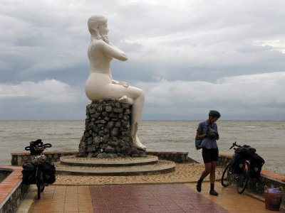 A statue of a Cambodian woman at the coast- the rain clouds were threatening again