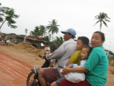 Cambodian family of five on a scooter (we passed them!)