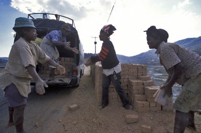 Loading the van with bricks