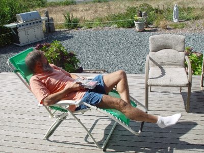 MIKE ENJOYING THE SUNSHINE AND VIEW FROM THE DECK
