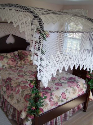 THIS WAS ONE OF THE BEDROOMS WITH A CANOPY BEAD