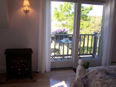 THE MASTER BEDROOM HAD A BALCONY OVERLOOKING THE BACK YARD TOWARD THE OCEAN