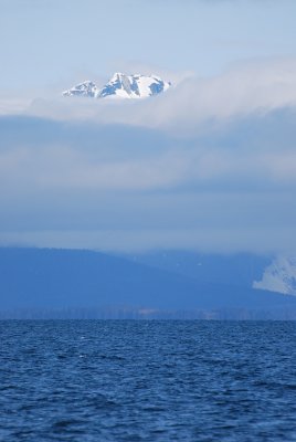 THE MOUNTAIN TOPS PEAKED OUT ABOVE THE CLOUDS