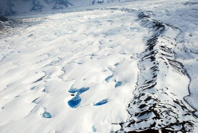 NOTICE THE RIDGES ON THE ICE FIELD-THIS IS WHERE DIFFERENT PLATES COLLIDE-RIDGE IS OVER A HUNDRED FT HIGH