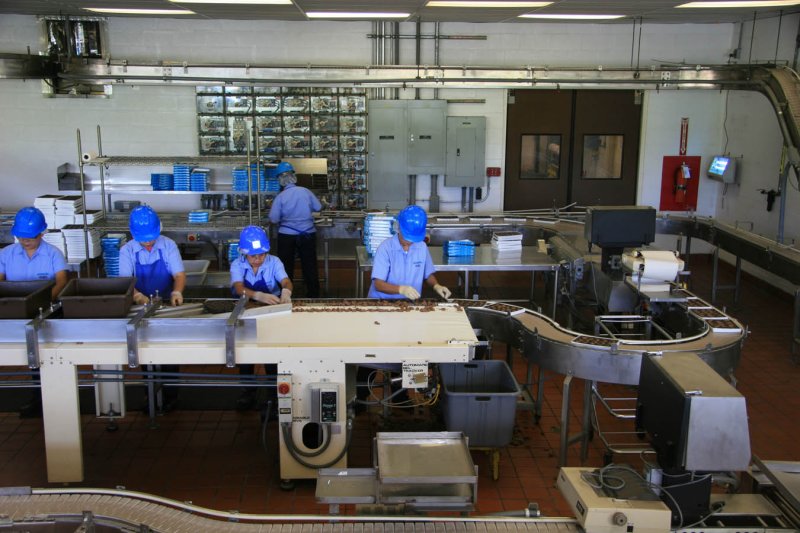 Ladies working at Mauna Loa Macadamia Nut Factory (remind anyone of a I Love Lucy episode???)