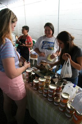 Angela buying homemade jelly at Hilo Farmers Market